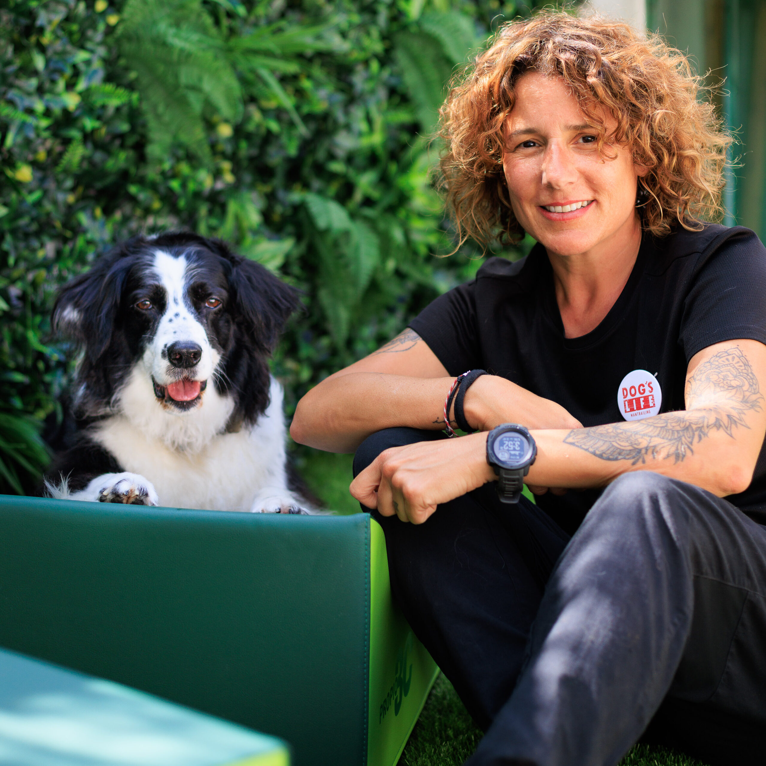 Instructor and dog posing.